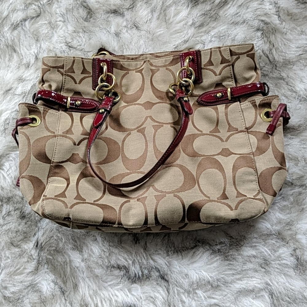 Coach logo handbag with red accents